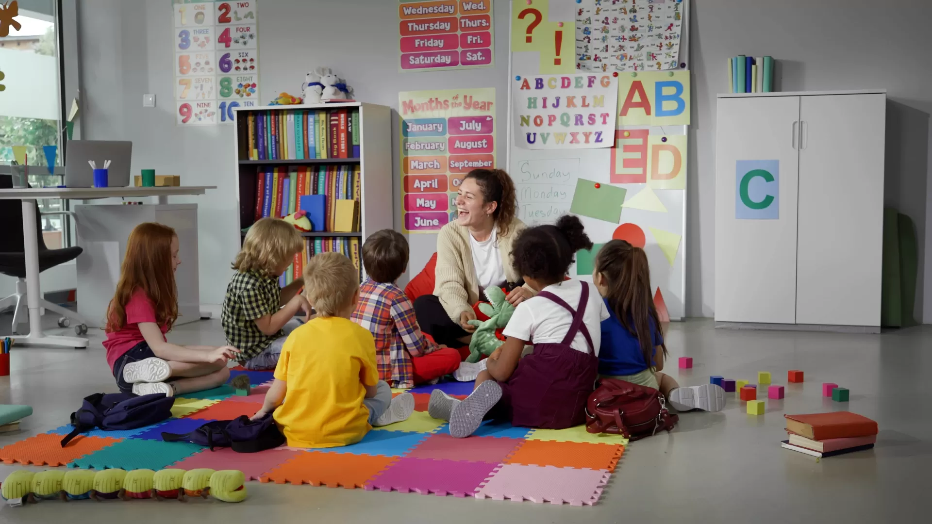 A woman completing her practical for a childcare apprenticeship.