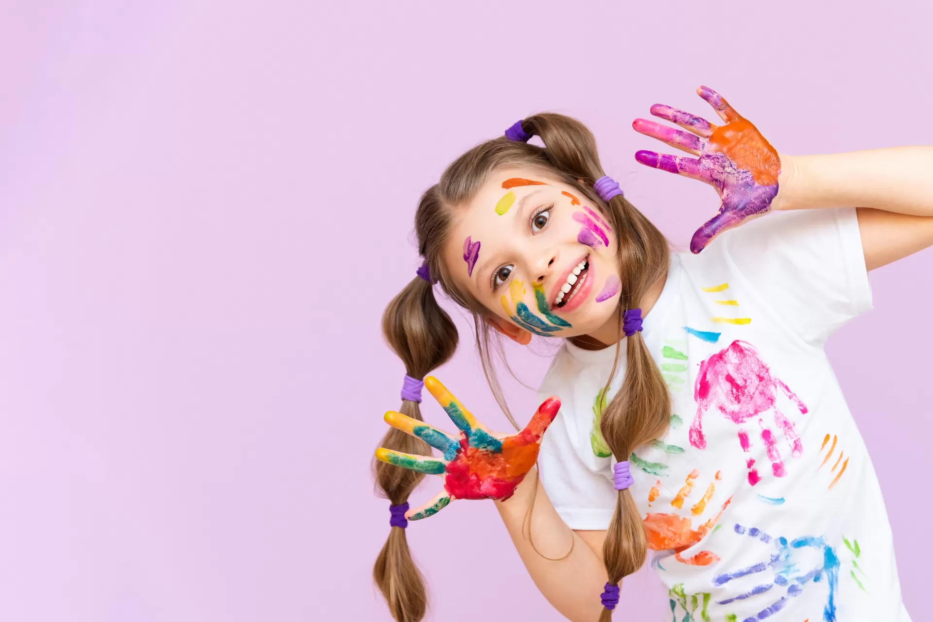 A girl with paint on her hand